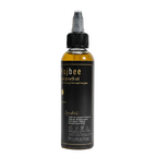 Bottle of Bajbee hair growth oil on a white background